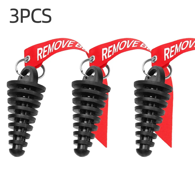 Three rubber exhaust wash plugs with red tags and keychain hardware for motorcycles and dirt bikes