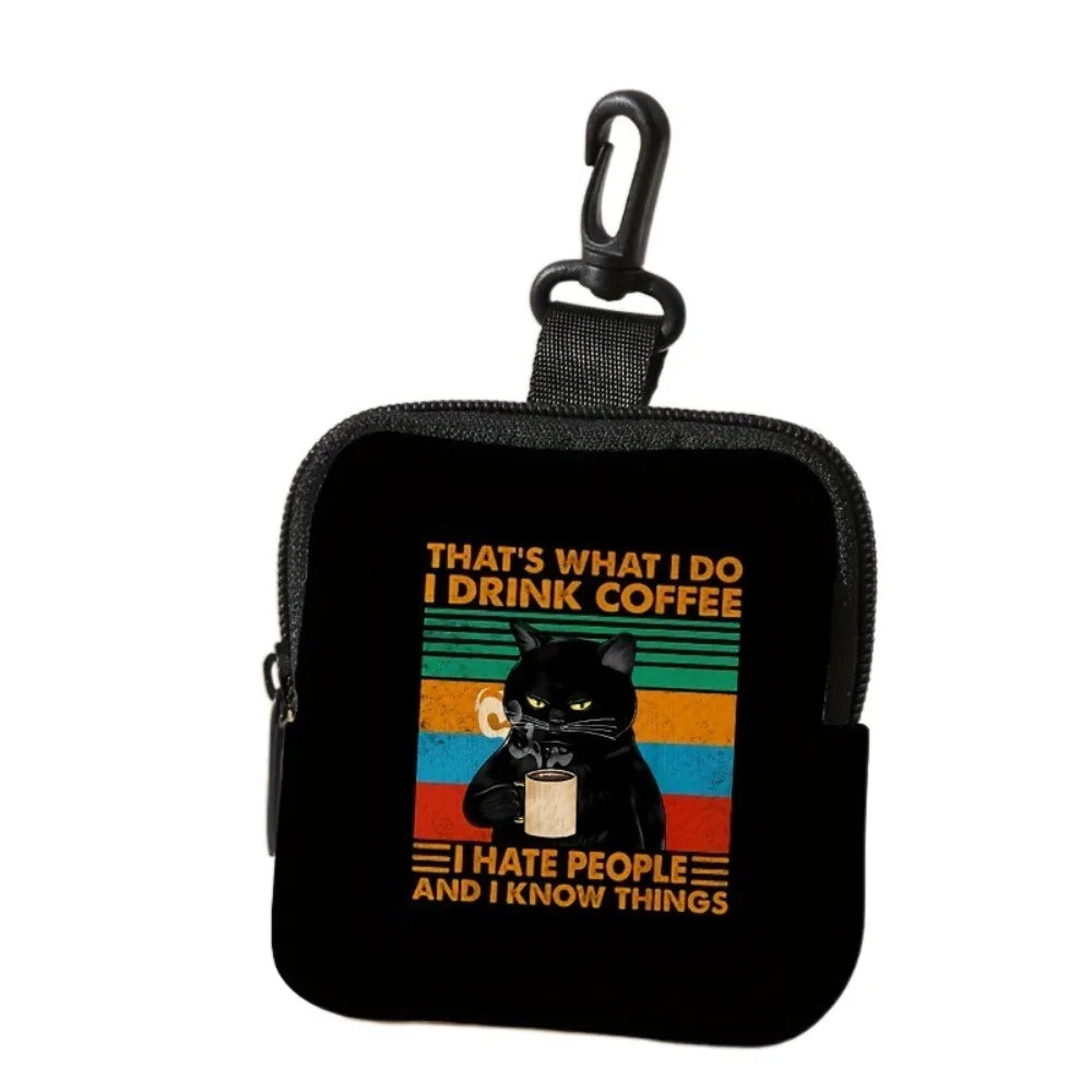 Black pouch with a graphic of a cat drinking coffee on it