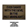 A dark brown embroidered patch with black text that reads Ever Dance With The Devil In The Pale Moonlight