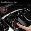 A hand presses a red button on a black ignition cover, demonstrating the start-up immersive feature.