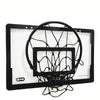 A portable mini basketball hoop set with a black rim and net mounted on a white board.