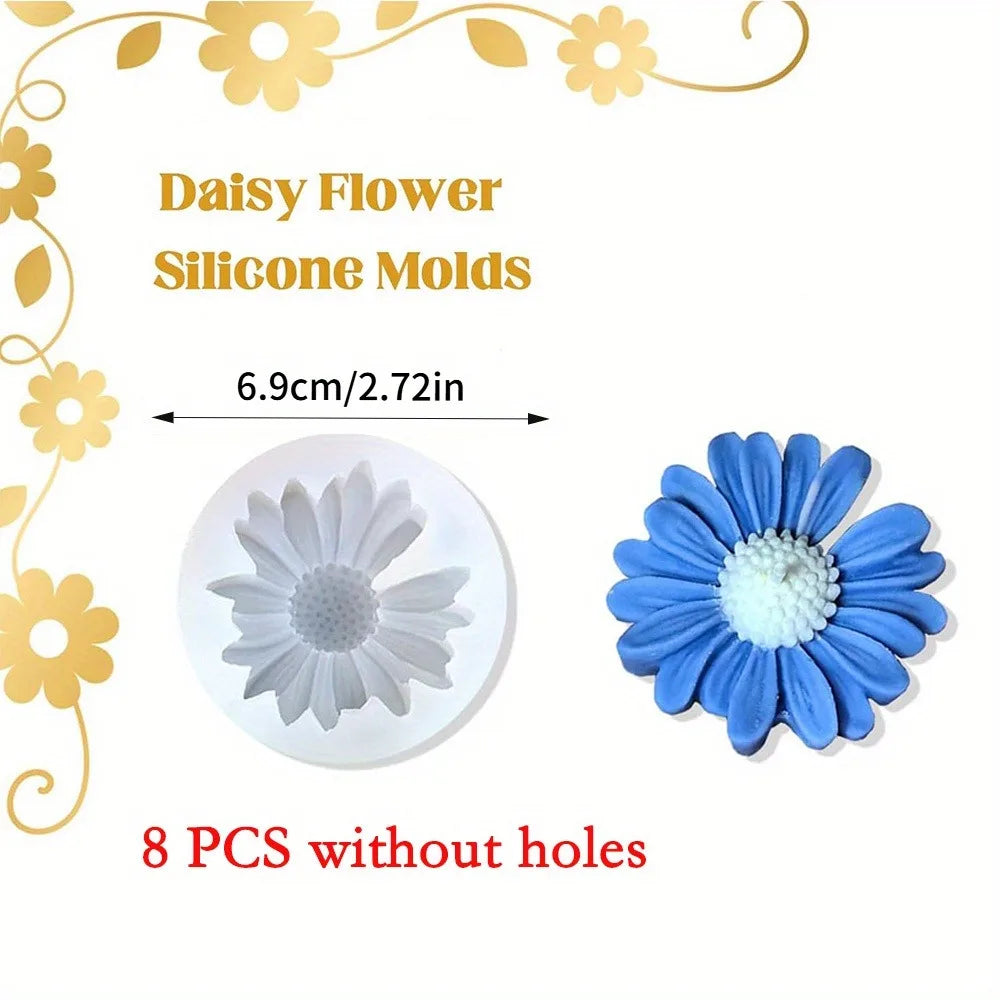 Eight silicone molds of daisy flowers in blue and white for resin and craft projects