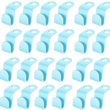 A set of light blue space-saving cascading hanger connectors for closet organization.