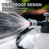 A close-up of a white hand pump foam sprayer effectively spraying a fine mist onto a surface.