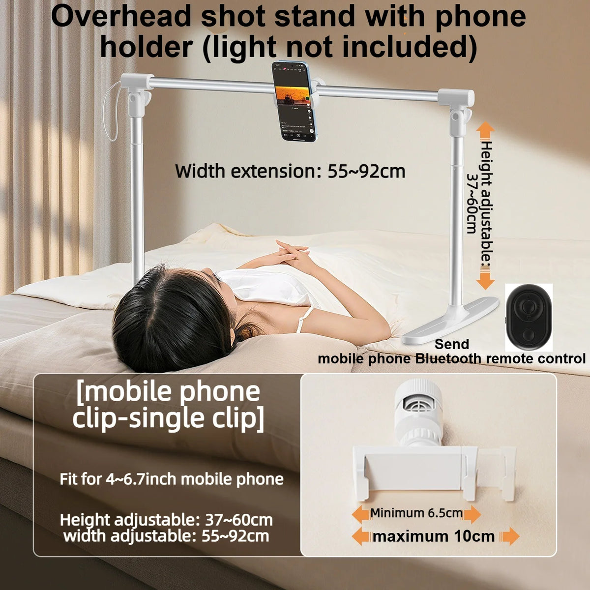 An overhead shot stand with a phone holder is shown positioned over a person lying on a bed.