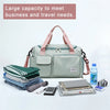 A light green waterproof travel duffle bag with a large capacity and shoe compartment, surrounded by folded clothing and acce
