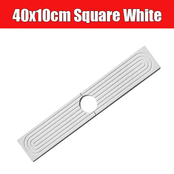 A white square diatomite mat with parallel grooves and a hole, used as a quick-dry faucet mat.
