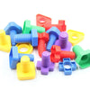 A collection of colorful screw and nut building blocks in various shapes and colors.