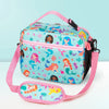 A pink insulated lunch bag featuring a colorful mermaid design with an adjustable shoulder strap.