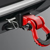 A close-up view of a red heavy-duty shackle hitch receiver with a D-ring and trailer pin mounted on a silver vehicle frame.