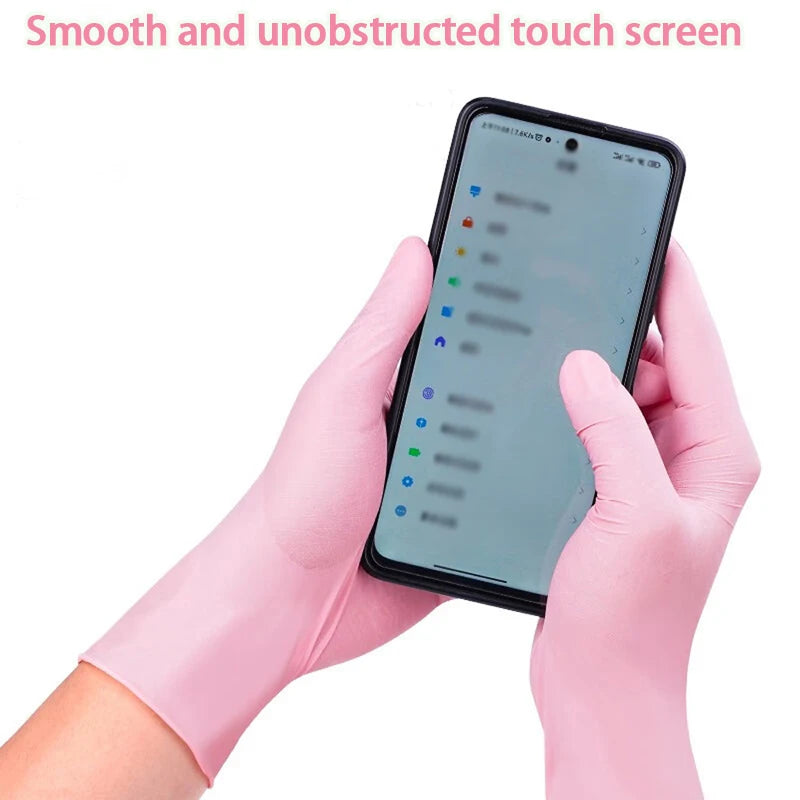 Pink nitrile gloves holding a smartphone with a smooth and unobstructed touch screen
