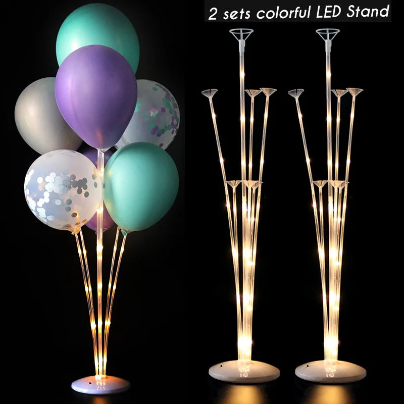 Two sets of colorful LED stand balloons used for party decor