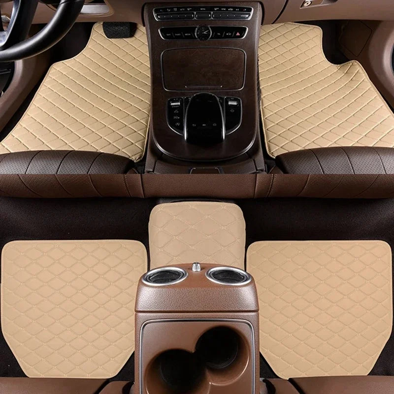 Interior view of a car with tan quilted floor mats and dark brown leather trim.