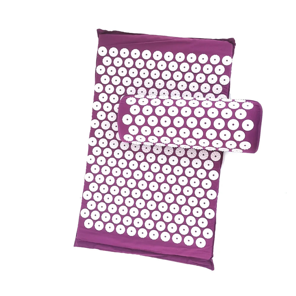 Purple acupressure mat and pillow set with white dots for pain relief and relaxation
