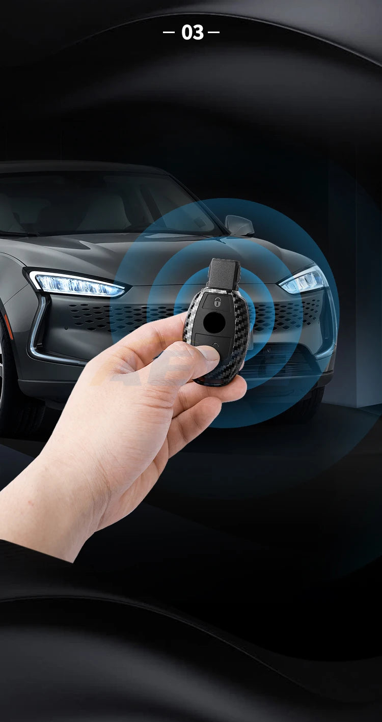 A hand holds a slim carbon fiber car key cover, demonstrating its fit for a vehicle lock.