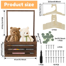 Wooden storage crate with a long handle for baby toys and clothing, showing various sizes of wooden clothespins.