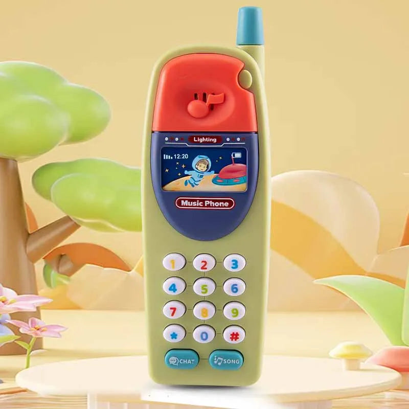 A yellow kids learning toy smartphone with an orange top and blue accents, resting on a light wooden surface.