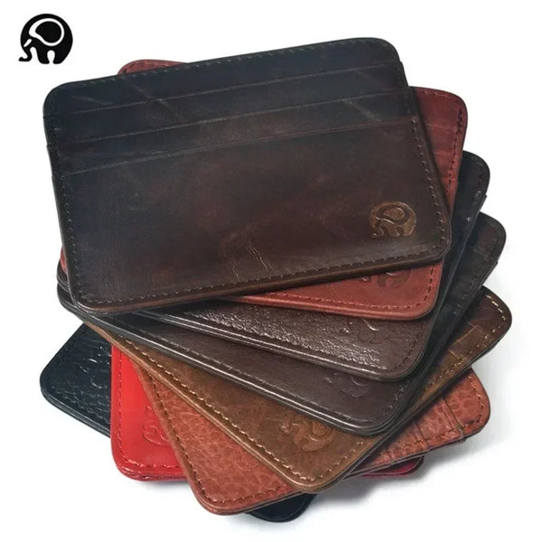 A stack of dark brown and reddish-brown genuine leather card holder wallets.