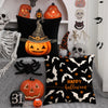 Un juego de fundas decorativas temáticas de Halloween en negro y naranja con calabazas, murciélagos y calaveras.