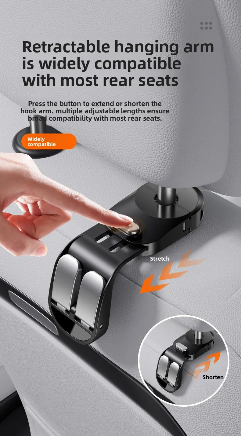A hand is adjusting a retractable hanging arm on a car seat using a button to extend or shorten the hook arm.