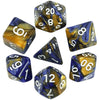 A collection of seven polyhedral dice in various colors and angles for role-playing games