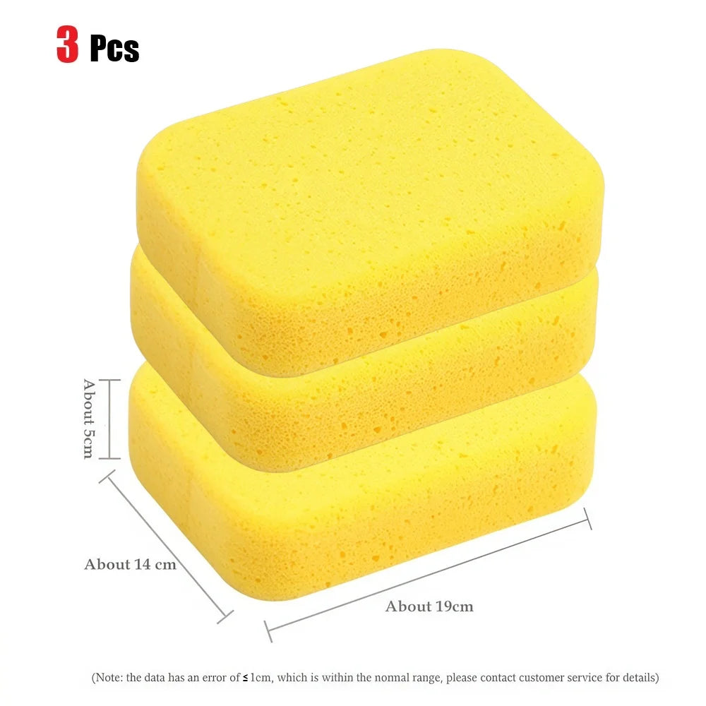 A set of three yellow high-density car wash sponges for auto detailing and waxing.