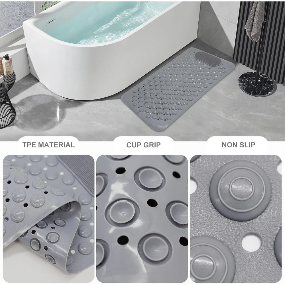 A gray non-slip suction cup bath mat with massage nodes shown next to a bathtub.