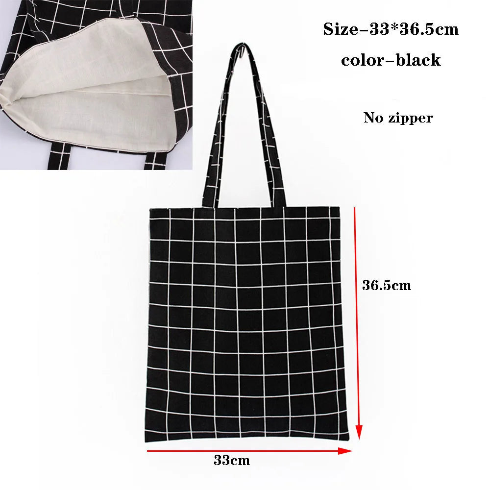 Black plaid canvas tote bag with light beige lining and black handles