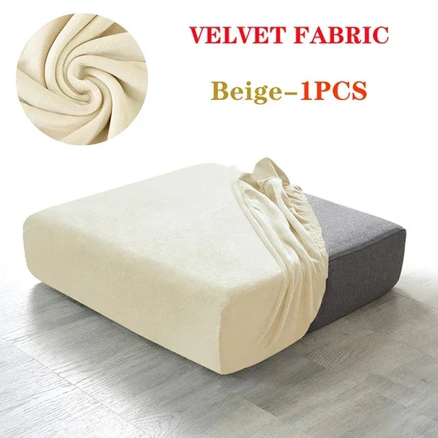 A beige velvet fabric sofa cover displayed on a gray cushion, showing the texture and drape of the fabric.