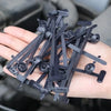 A hand holds several black self-locking nylon cable tie buckles for repairs.