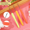 A set of finely polished crochet hooks with smooth yellow and orange handles and a clear scale showing the 1.25mm size.