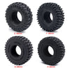 Four black soft rubber tires labeled E, F, G, and H, designed for RC crawler cars.