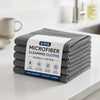 A stack of six gray microfiber cleaning cloths labeled as a set of 6 pcs.