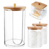 Clear acrylic bathroom storage cylinder with a bamboo lid and a separate cylindrical container.