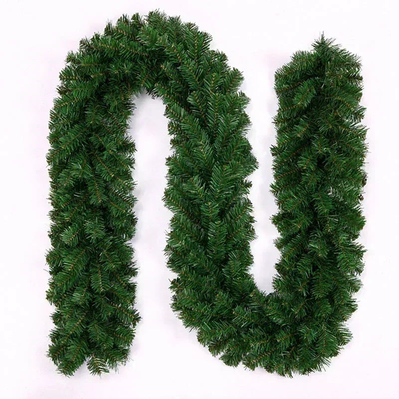 Green artificial pine garland shaped like the letter N for holiday decoration