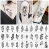 Colección de pegatinas de tatuajes temporales con diseños de luna, estrella, diablo y flor.