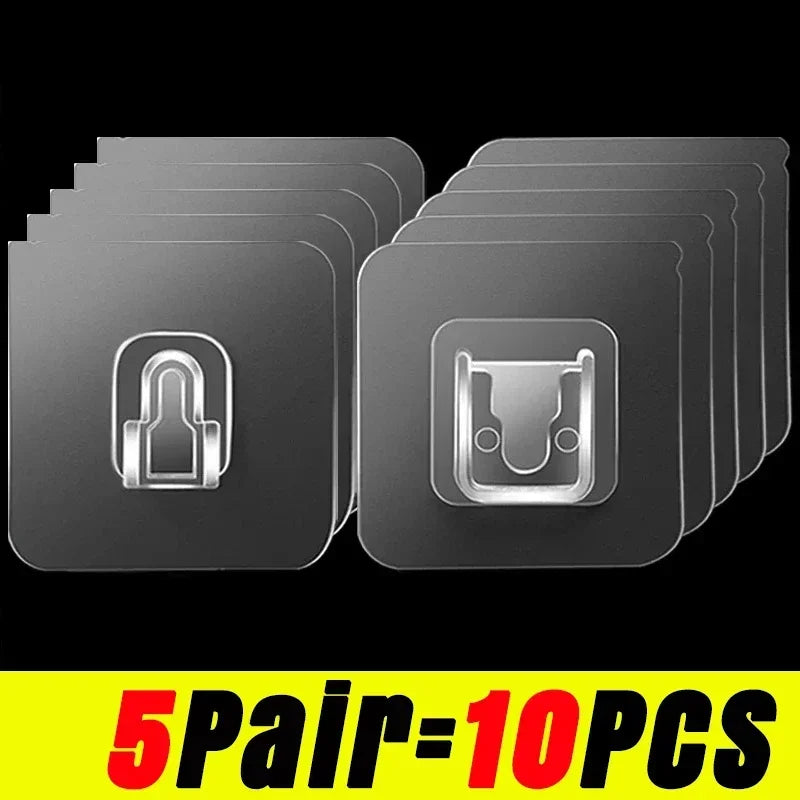 A set of five pairs of clear double-sided adhesive wall hooks stacked on a black background.