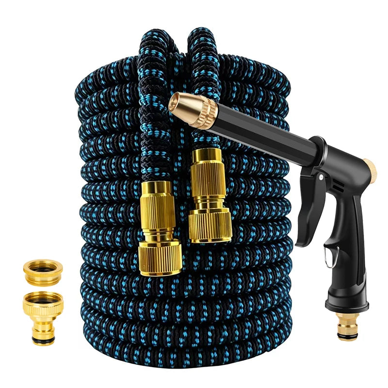 A coiled black and blue expandable garden hose with a gold-colored adjustable spray nozzle.