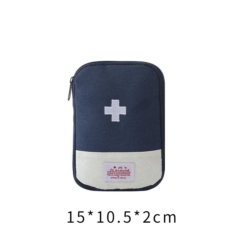 A dark blue portable mini first aid kit organizer bag with a white cross emblem.