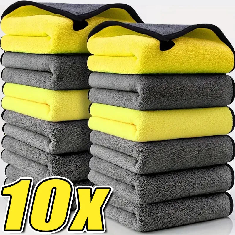 A stack of ten yellow and gray microfiber cleaning towels.
