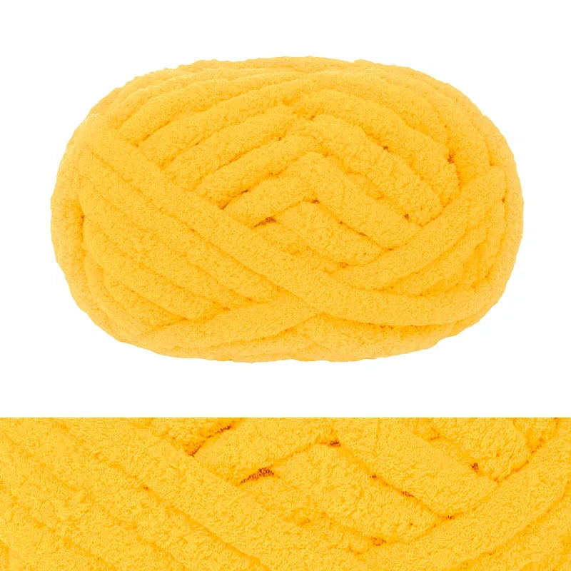 A ball of bright yellow chunky chenille yarn with a ribbed texture.