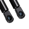 A pair of black heavy-duty hood lift supports for a Jeep Liberty, showing the threaded and gripping ends.