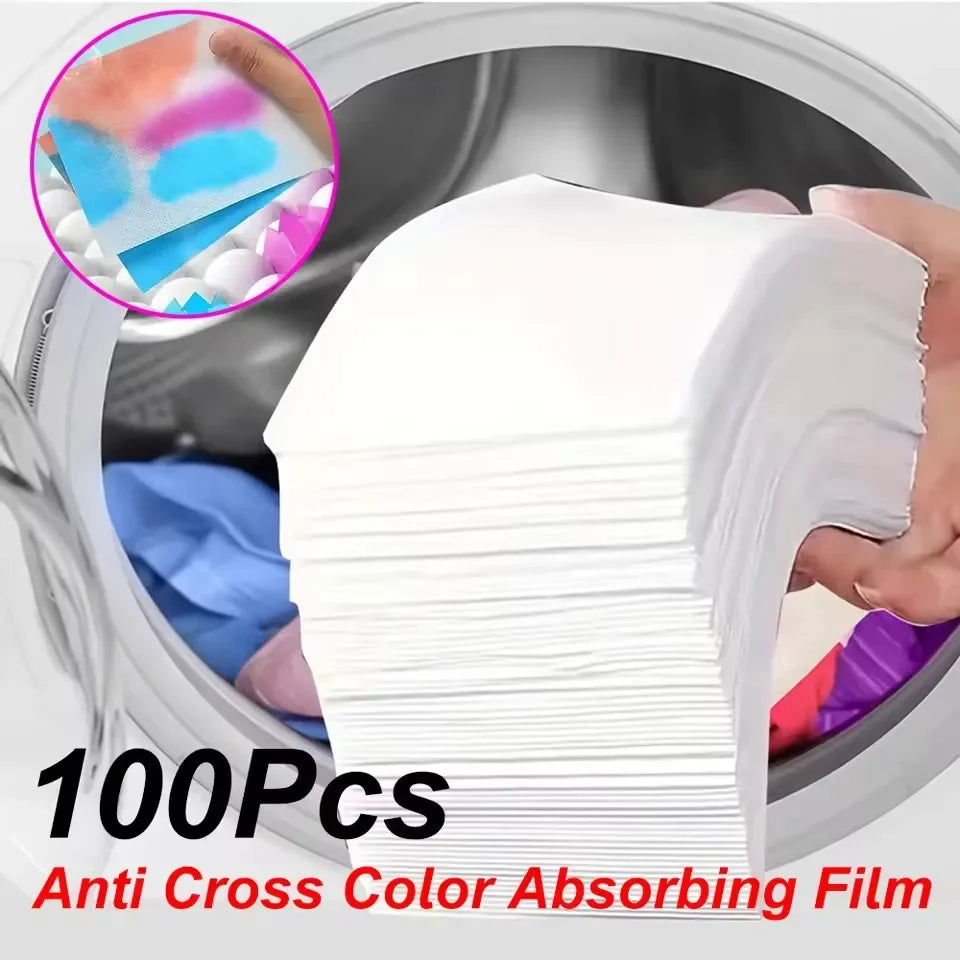 A stack of white anti cross color absorbing film sheets inside a washing machine drum.