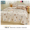 A beige duvet cover with a floral pattern featuring small teddy bears and mice, displayed on a bed.