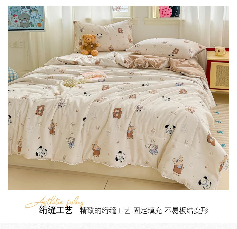 A beige duvet cover with a floral pattern featuring small teddy bears and mice, displayed on a bed.