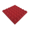 A pack of red pyramid acoustic foam panels used for soundproofing.