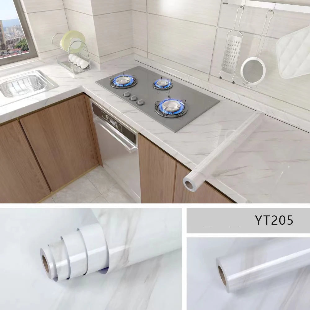 Rolls of white marble effect self-adhesive PVC film used for countertops and cabinets