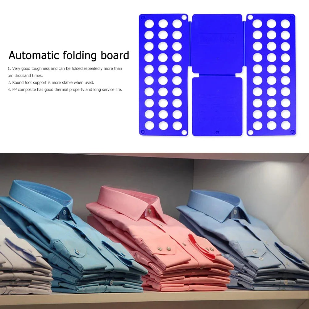 A blue plastic clothes folding board with multiple holes is shown next to stacks of folded shirts.