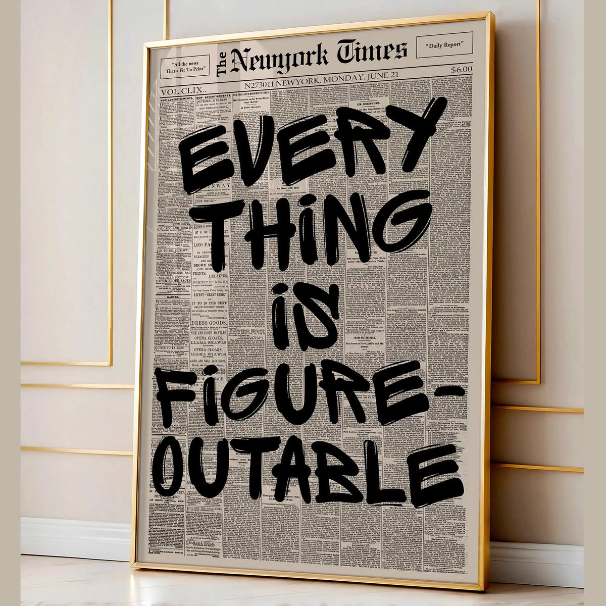 Framed canvas wall art featuring a black and white newspaper-style quote that reads Every Thing is Figure-Outable.