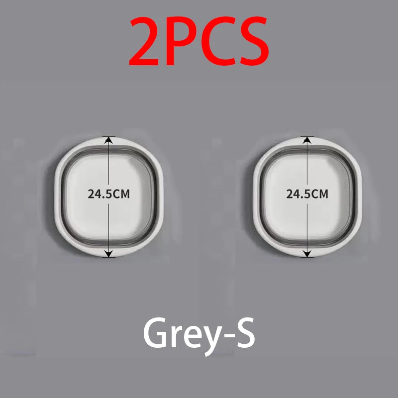 Two grey plastic wash basins, 24.5cm in diameter each.